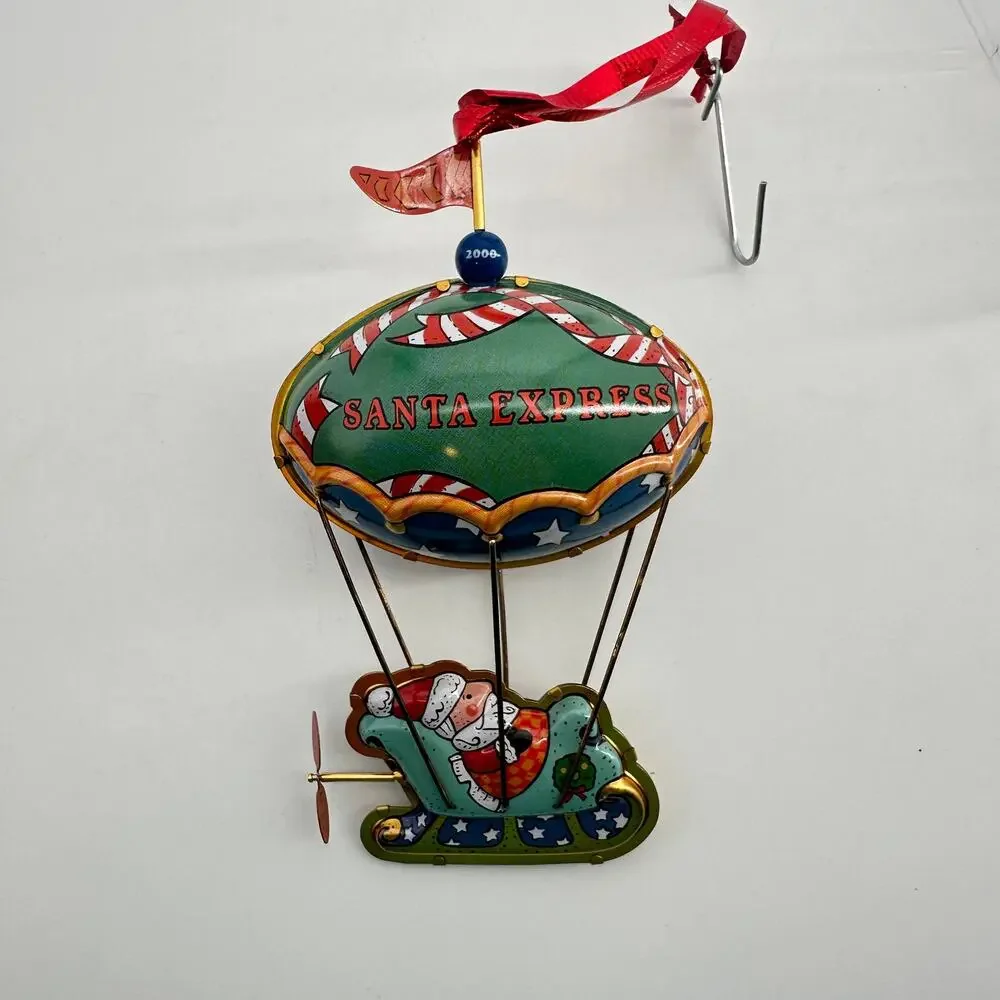 2000 Hallmark Keepsake Merry Ballooning Santa Express Pressed Tin Ornament